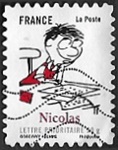Nicolas rédigeant une lettre Nicolas rédigeant une lettre